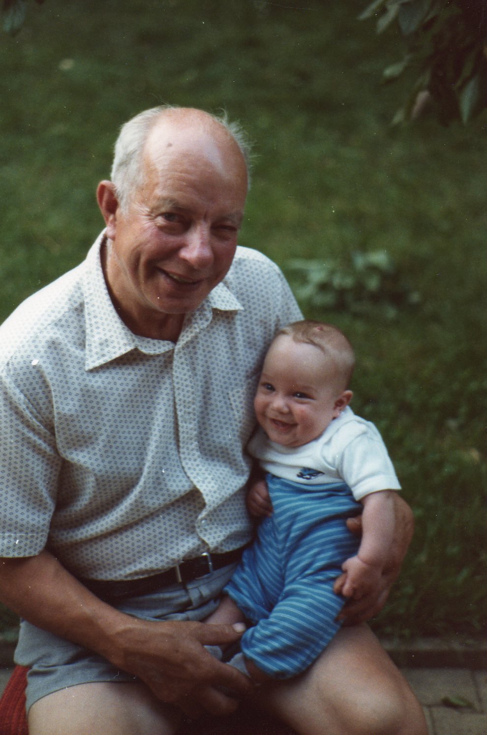 Marc as a baby on his grandfather's lap